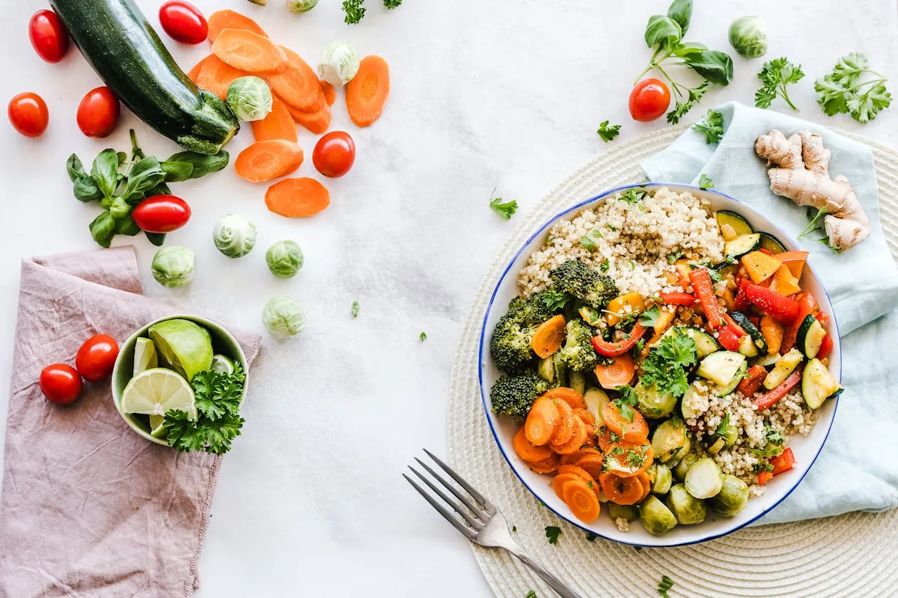 our-services-3 Colorful quinoa salad with fresh vegetables creates a healthy, balanced meal.